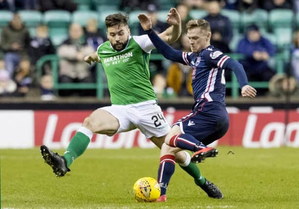 Darren McGregor tussles with Billy Mckay during the last meeting between the two teams. Picture: SNS Group