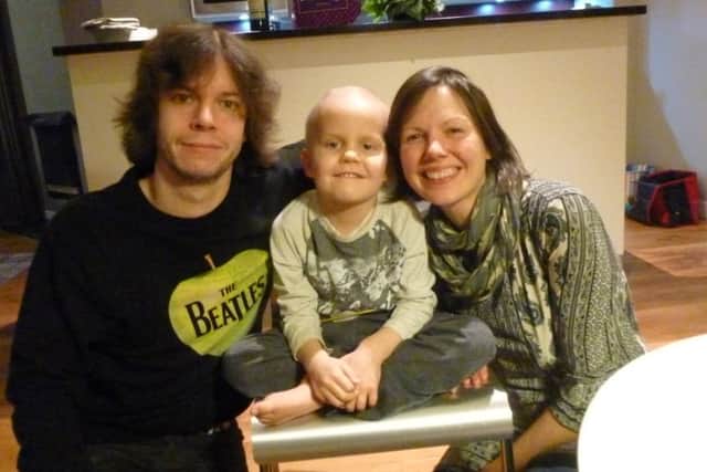 William Douglas and Ruth Barrie with Sol who is suffering from cancer. Theo is the older brother