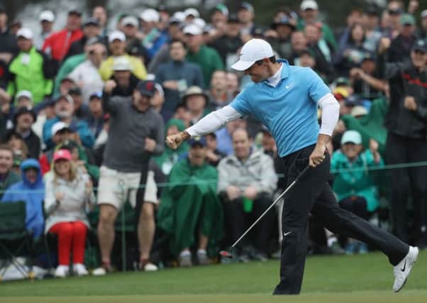 Rory McIlroy celebrates after closing with a birdie in a bogey-free 65 in the third round of the 82nd Masters. Picture: Getty Images