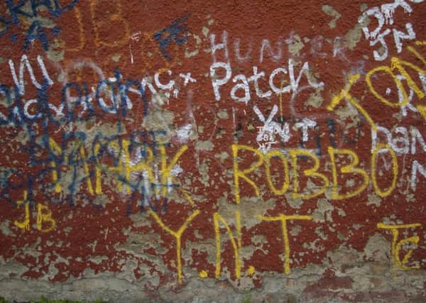 Graffiti is a growing problem in Edinburgh, making the city look ugly. Picture: Julie Bull