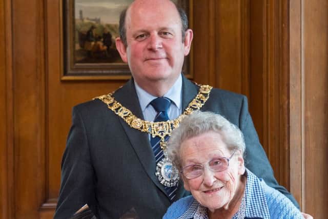 Edinburgh volunteer Doris Keir with the Lord Provost of Edinburgh, Frank Ross, at the City Chambers. Picture: Ian Georgeson