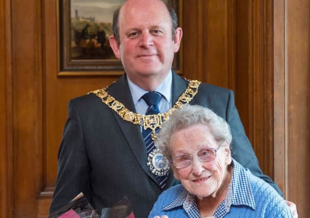 Edinburgh volunteer Doris Keir with the Lord Provost of Edinburgh, Frank Ross, at the City Chambers. Picture: Ian Georgeson