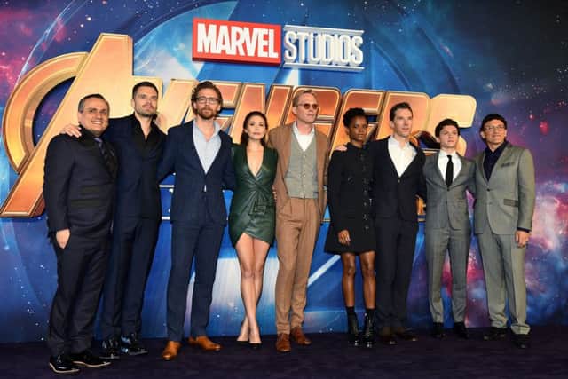 Joe Russo, Sebastian Stan, Tom Hiddleston, Elizabeth Olsen, Paul Bettany, Letitia Wright, Benedict Cumberbatch, Tom Holland and Anthony Russo attending the Avengers: Infinity War UK Fan Event held at Television Studios in London. Picture; PA
