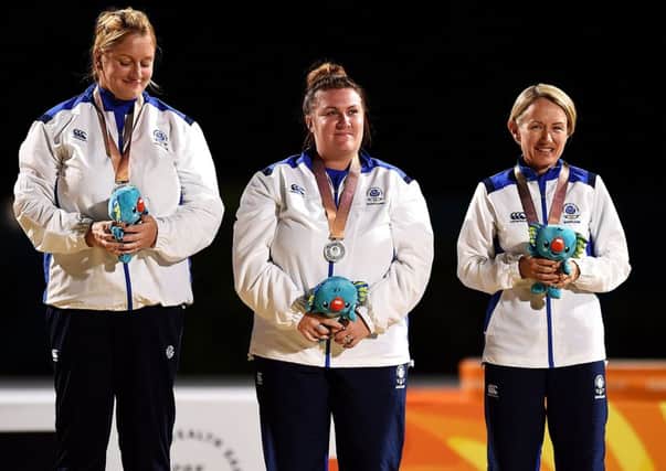 Silver medalists Caroline Brown, Stacey McDougall and Kay Moran