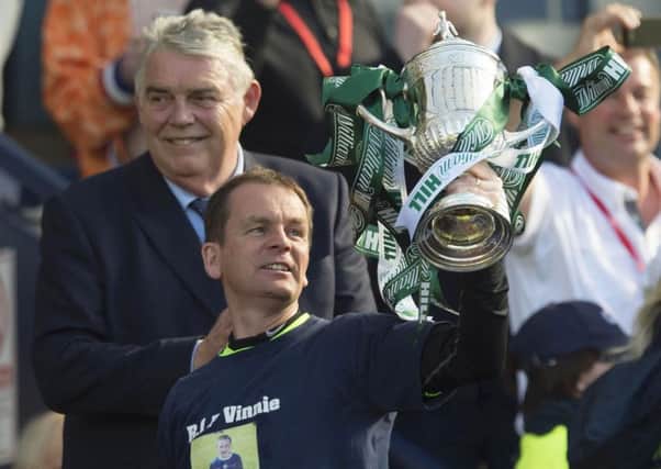 John Doolan lifted the Scottish Cup while with Hibs - now he's targeting title success at Accrington