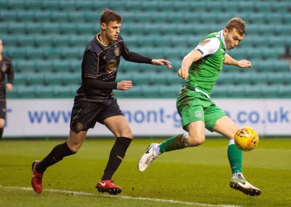 Ryan Porteous, right. inspired Hibs to victory. Pic: Ian Georgeson