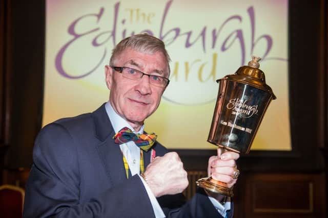 Boxer Ken Buchanan receives his Edinburgh award from Lord Provost Donald Wilson at The Edinburgh City Chambers