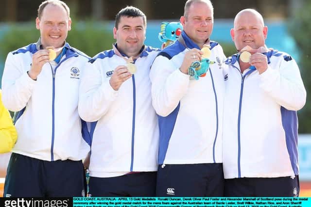 The winning Scottish team show off their medals