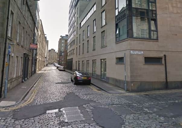 Plain clothes officers arrested 2 in the Capital on Thistle Street