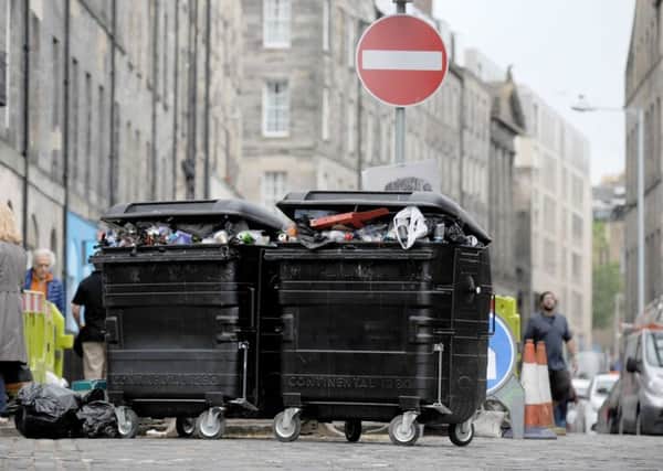 Over-flowing rubbish bins on Drummond Street, Edinburgh. Picture: Jane Barlow