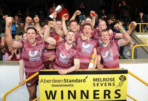 Watsonians captain Euan Miller lifts the Melrose Ladies Cup after defeating the home side in the Final.
Melrose Sevens Final. Pic: Fotosport/David Gibson