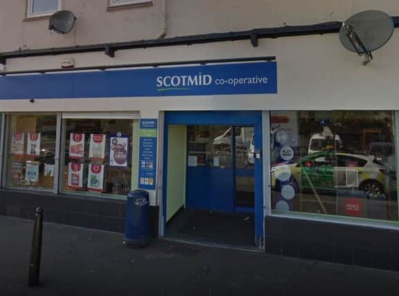 Scotmid staff were threated with what appeared to be a handgun