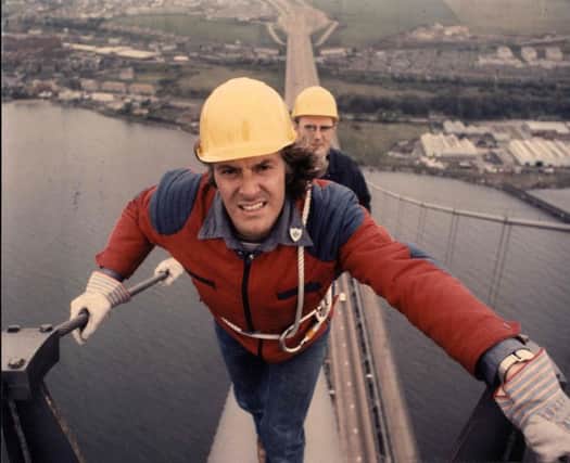 Peter Purves walking the cable of the Forth Bridges.