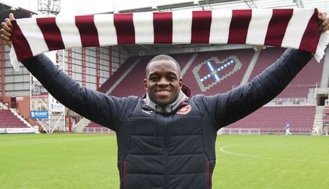 Uche Ikpeazu is unveiled as a Hearts player at Tynecastle. Picture: heartsfc.co.uk