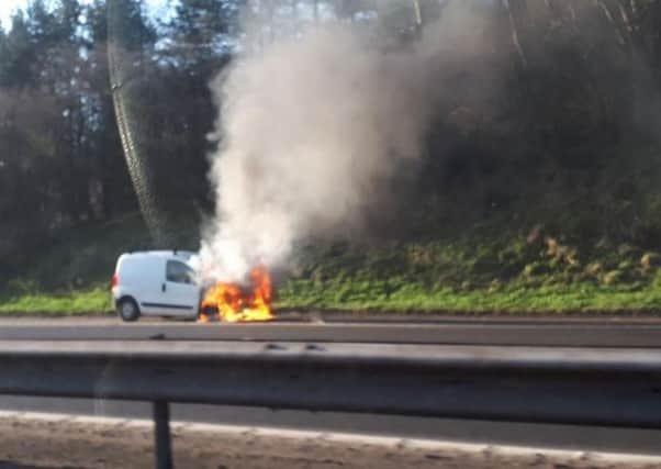 A white van was on fire on the M8. Picture; contributed