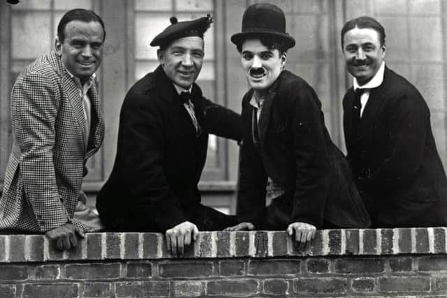 Sir Harry Lauder (second left) with Sir Charlie Chaplin (second right). Picture: PA