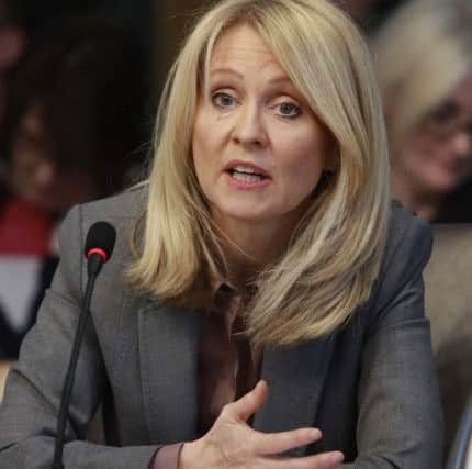THIS IMAGE MUST NOT BE USED FOR PARTY POLITICAL PURPOSES.

Handout photo issued by the Scottish Parliament of Work and Pensions Secretary Esther McVey who was heckled by members of the public in a Holyrood committee meeting covering Universal Credit and the rape clause. PRESS ASSOCIATION Photo. Picture date: Monday April 16, 2018. See PA story POLITICS Welfare. Photo credit should read: Andrew Cowan/Scottish Parliament/PA Wire 

NOTE TO EDITORS: This handout photo may only be used in for editorial reporting purposes for the contemporaneous illustration of events, things or the people in the image or facts mentioned in the caption. Reuse of the picture may require further permission from the copyright holder.