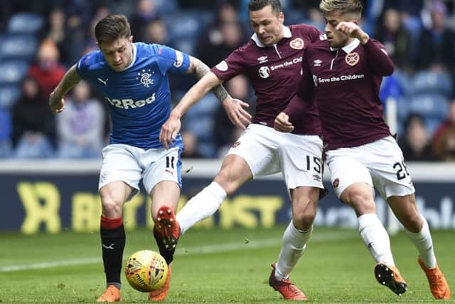 Marcus Godinho, right, was forced off against Rangers on Sunday