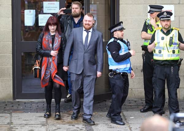 Mark Meechan leaves Airdrie Sherriff Court, with girlfriend Suzanne Kelly, where he was fined after being found guilty of a hate crime. April 23 2018. Picture; Centre Press