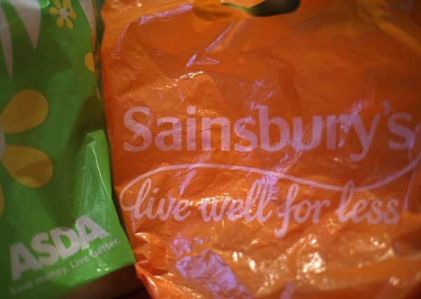 Asda and Sainsbury's are planning a merger. Picture: PA