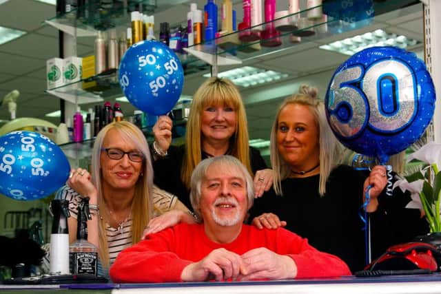 Dennis wilson with staff members l to r: Lissa Bow, Anne Walker and Linzi Naismith.