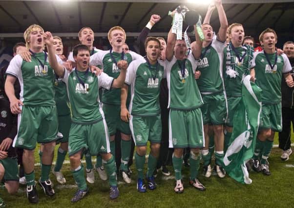 The Hibs team celebrate their SFA Youth Cup triumph over Rangers at Hampden in 2009
