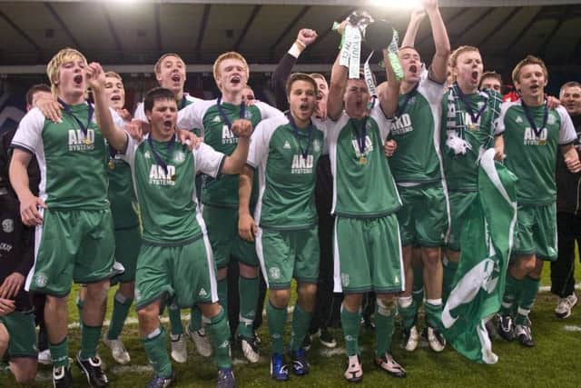 The Hibs team celebrate their SFA Youth Cup triumph over Rangers at Hampden in 2009