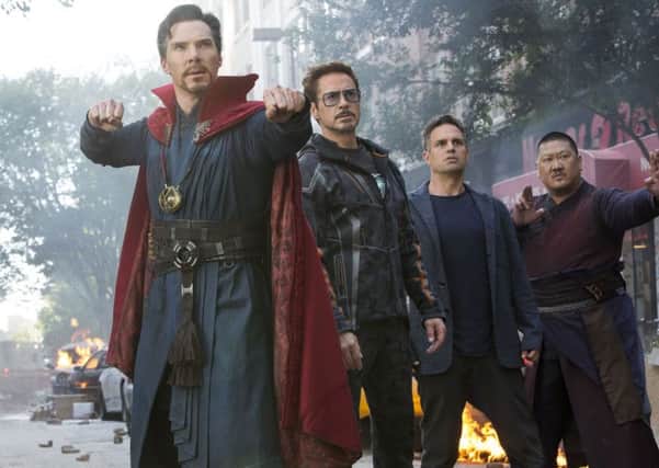 Benedict Cumberbatch, Robert Downey Jr., Mark Ruffalo and Benedict Wong in a scene from "Avengers: Infinity War." Picture; (Marvel Studios via AP)