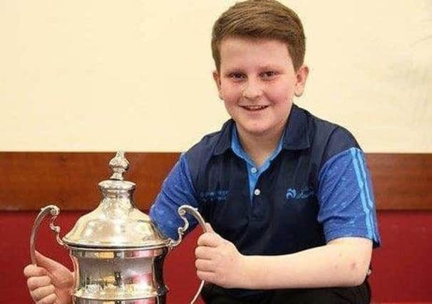 Aaron Betts is Under-13, Under-17 and Under-25 Singles champion at East Lothian