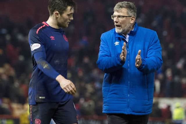 John Souttar with Craig Levein at full time at Pittodrie
