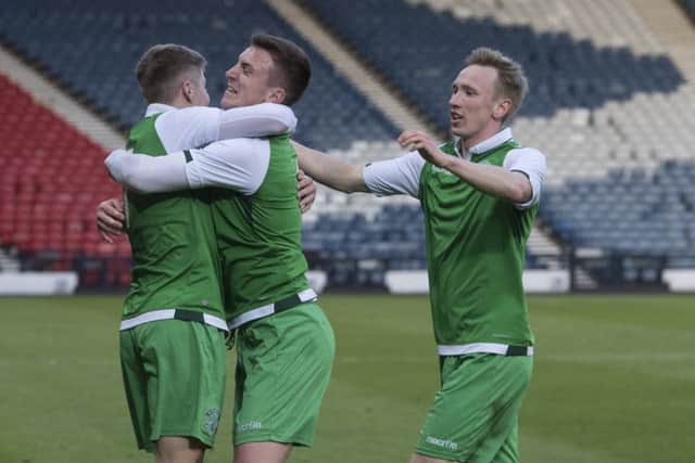 Hibs celebrate scoring against Aberdeen at Hampden. Pic: John Devlin