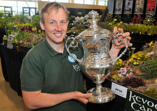Graham Gunn, Manager of Kevock Garden Plants  with the trophy for Best in Show for horticultural displays at theHarrogate Spring Flower Show