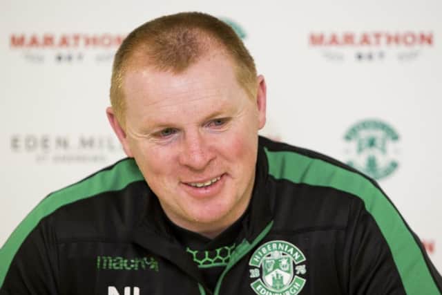 Neil Lennon speaks to the media