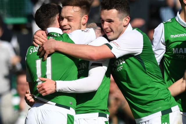 Brandon Barker celebrates with Hibs team-mates after he made it 5-3 against Kilmarnock