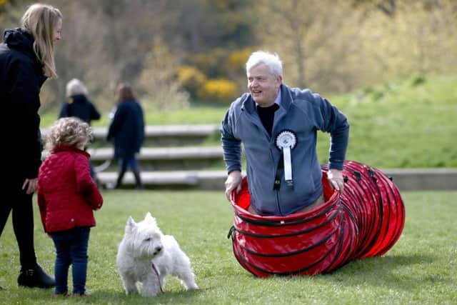 Politician Maurice Corry MSP and his dog Bobby tackle the obstacle course as they take part in the Holyrood Dog of the Year 2018 at the Scottish Parliament, Edinburgh. Picture; PA