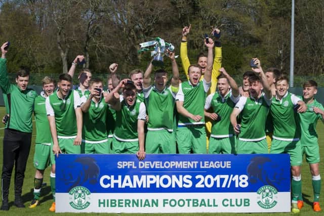 Hibs Under-20s show off the SPFL Development League trophy. Pic: Ian Rutherford
