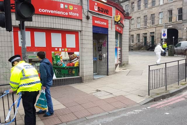 The police cordon at the scene has now been lifted, however the shop remains closed. Picture: Johnston Press