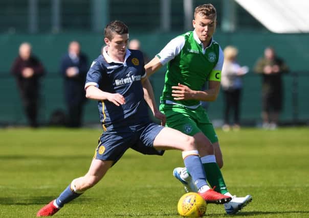 Ryan Porteous, right, has captained Hibs' Development Squad to a league and cup double. Pic: SNS