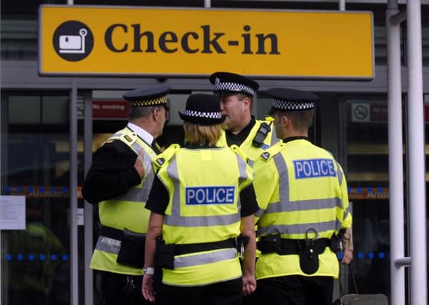 The housebreaker was detained by police at Edinburgh Airport. Picture: Sean Bell/TS