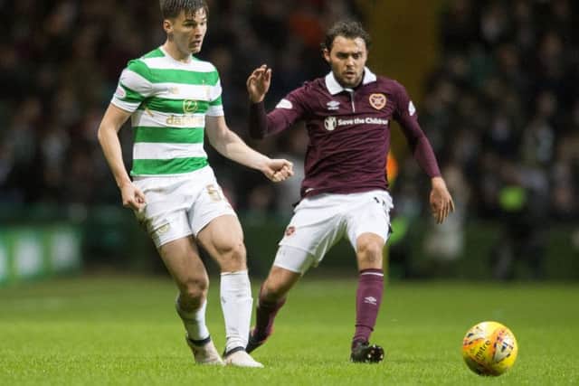 Kieran Tierney contests the ball with Connor Randall during the last meeting between the two teams. Picture: SNS Group