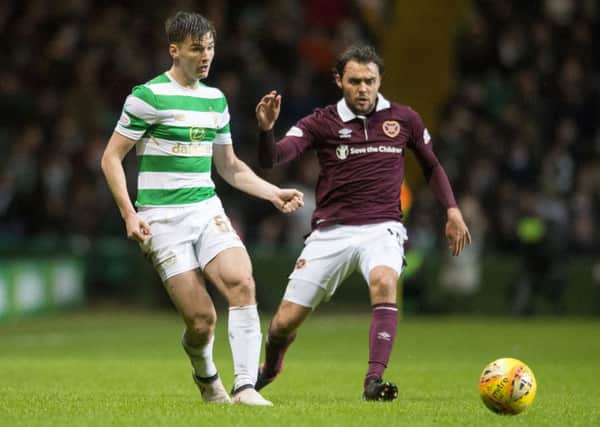 Kieran Tierney contests the ball with Connor Randall during the last meeting between the two teams. Picture: SNS Group