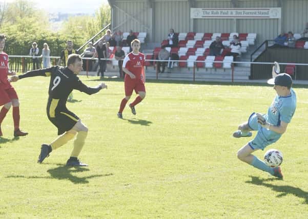 Keith Murray of Lothian Thistle scores the winning goal in extra time. Pic: Greg Macvean