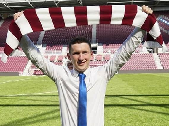 Bobby Burns at Tynecastle Park after signing for Hearts. Pic: Heart of Midlothian FC