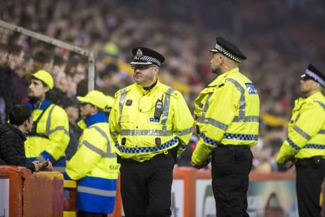 Officers arrested six people for a variety of offences before and during the match.