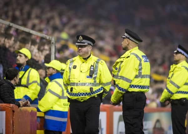 Officers arrested six people for a variety of offences before and during the match.