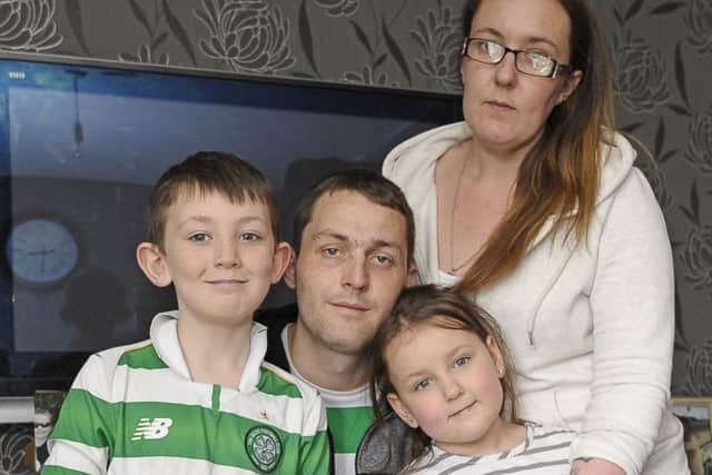 Leanne Thorburn with partner  Jim Muir and children. Picture: Neil Hanna