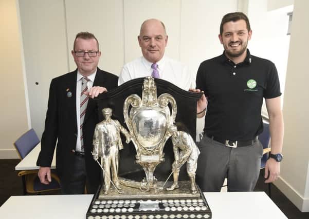 The draw for the Dispatch Trophy golf tournament is made by (left to right) Paul Gibson (Lothians President), Ken Harvey (Edinburgh Leisure) and George Ackroyd (golfclubsforcash). Pic: Greg Macvean