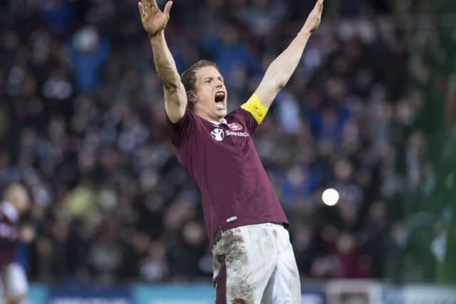 Hearts captain Christophe Berra will miss the final game of the season through suspension. Picture: SNS