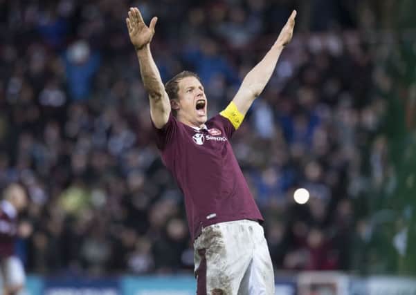 Hearts captain Christophe Berra will miss the final game of the season through suspension. Picture: SNS