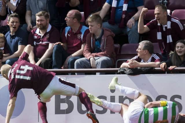 Steven Naismith has been punished for this tackle on Scott Brown. Pic: SNS